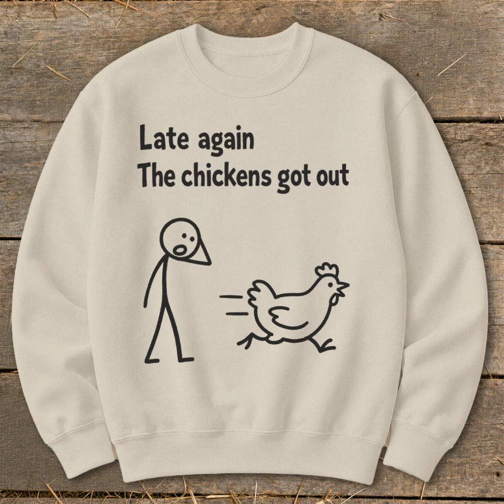 Cream sweatshirt with stick figure and running chicken graphic, text "Late again The chickens got out".