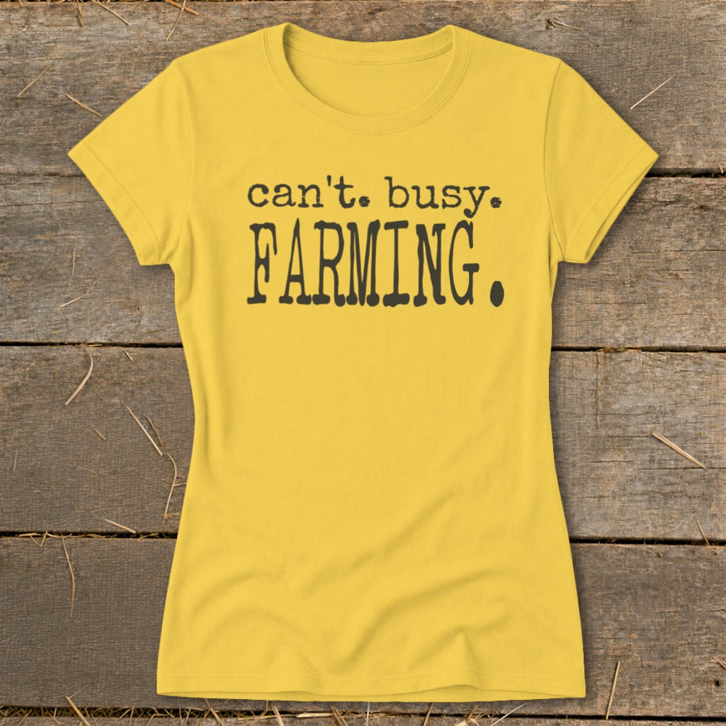 Yellow t-shirt with black text that reads "can't. busy. FARMING."