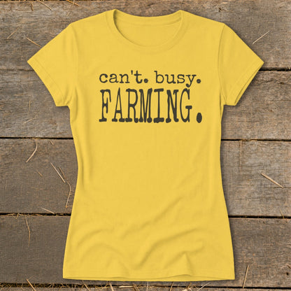 Yellow t-shirt with black text that reads "can't. busy. FARMING."