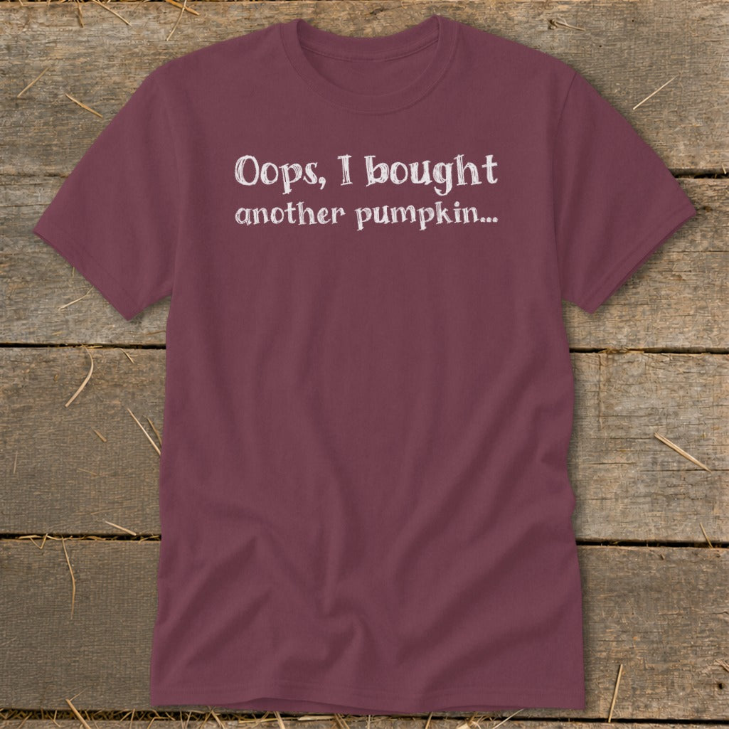 Maroon t-shirt with white text reading "Oops, I bought another pumpkin..."