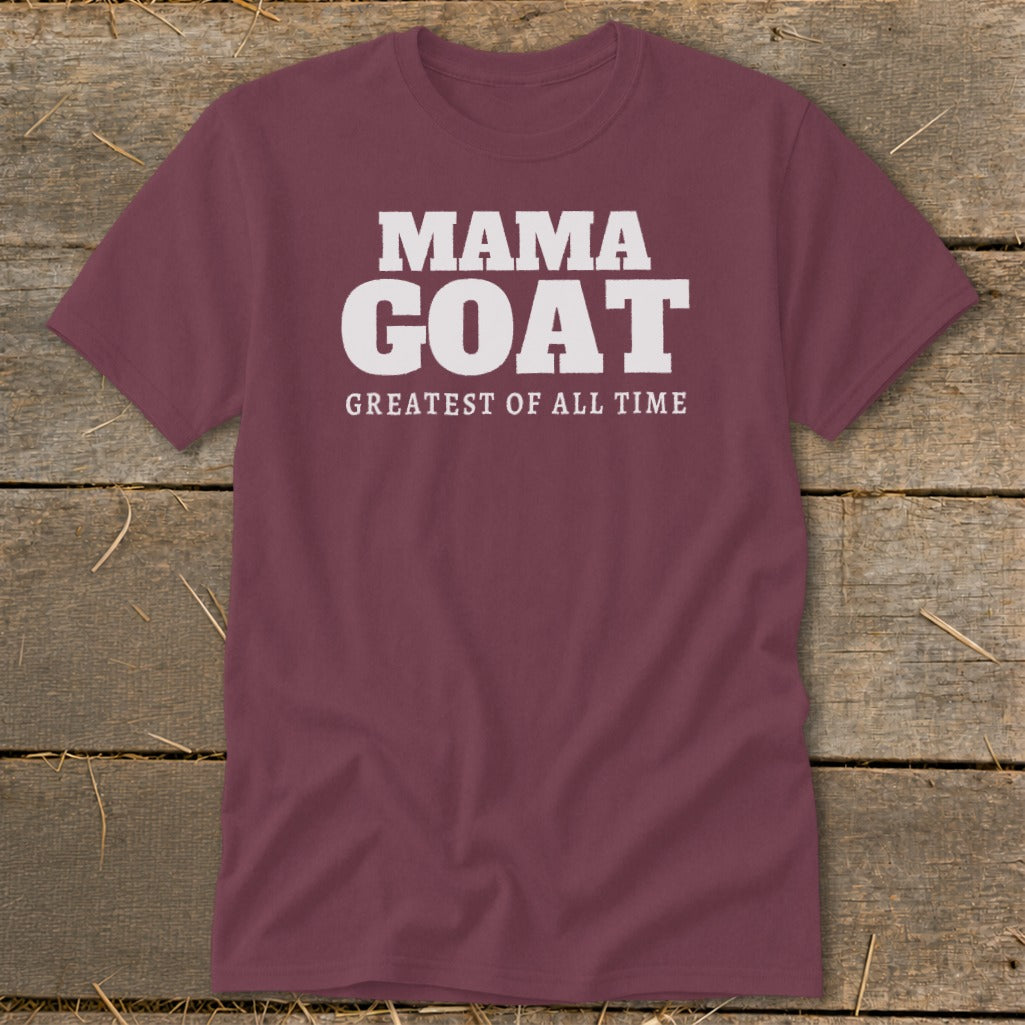 Maroon t-shirt with white text "MAMA GOAT GREATEST OF ALL TIME".