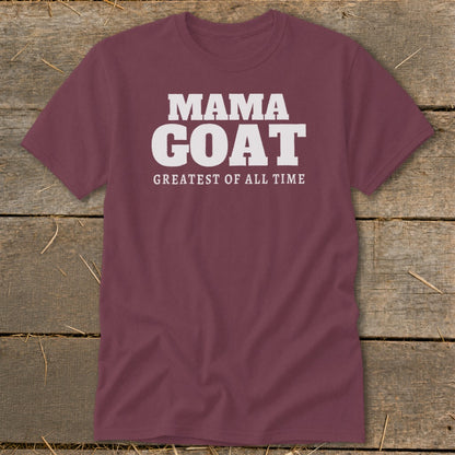 Maroon t-shirt with white text "MAMA GOAT GREATEST OF ALL TIME".