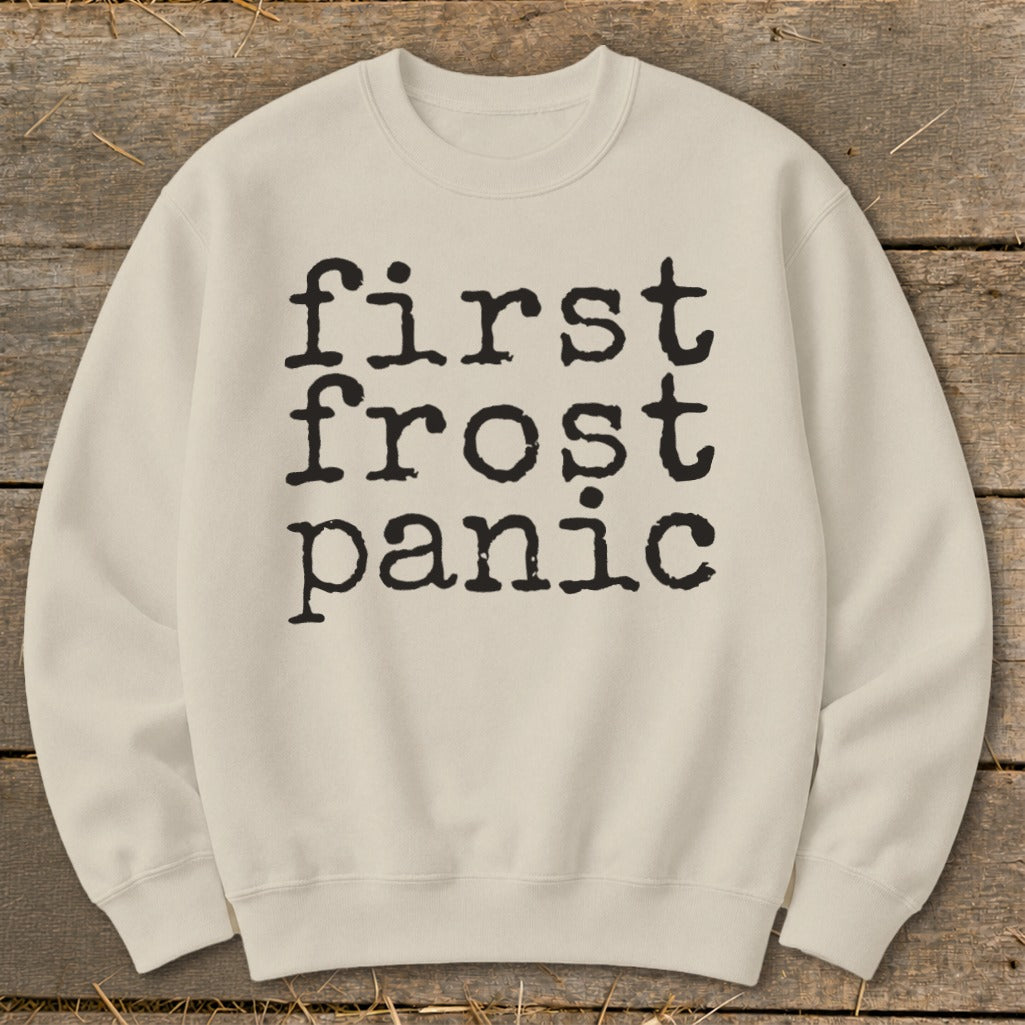Cream sweatshirt with black text reading "first frost panic".