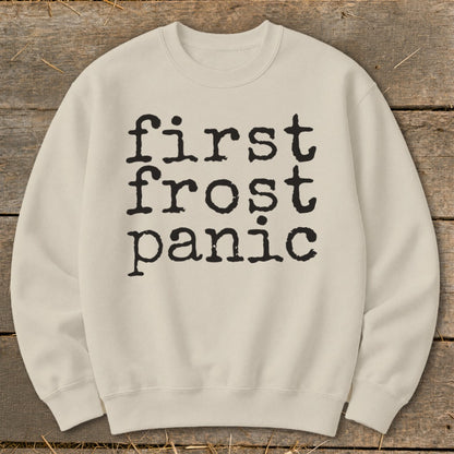 Cream sweatshirt with black text reading "first frost panic".
