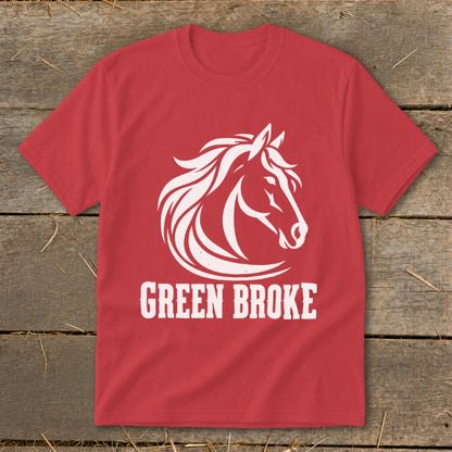 Red short-sleeve t-shirt with a white horse head graphic and the text GREEN BROKE on wooden planks.