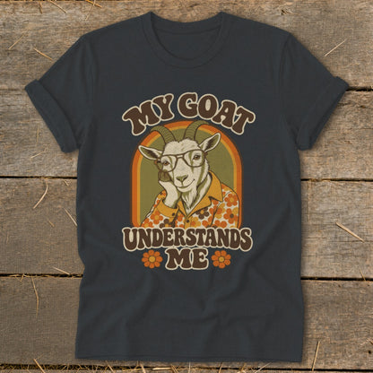 T-shirt graphic with a goat wearing glasses and a retro shirt, text "MY GOAT UNDERSTANDS ME".