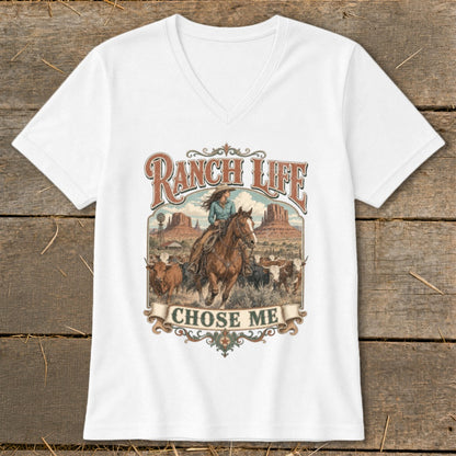 White t-shirt graphic with woman on horseback, cows, and "Ranch Life Chose Me" text.
