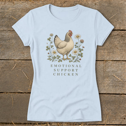 Light blue t-shirt with a chicken, clover, and flowers graphic and text "Emotional Support Chicken."