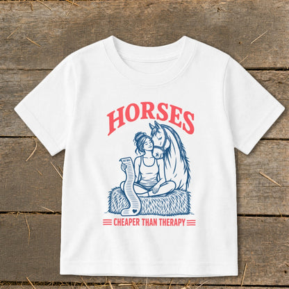 White t-shirt with "Horses Cheaper Than Therapy" graphic of woman with horse and vet bill.