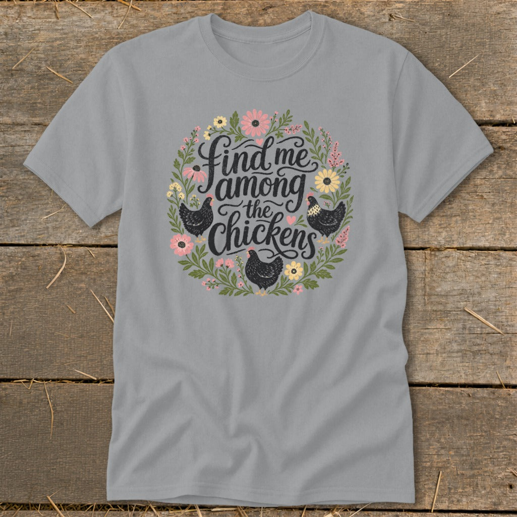 Gray t-shirt with "Find me among the chickens" in floral wreath with chickens.