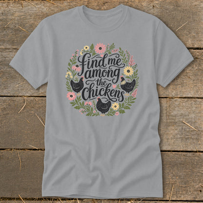 Gray t-shirt with "Find me among the chickens" in floral wreath with chickens.