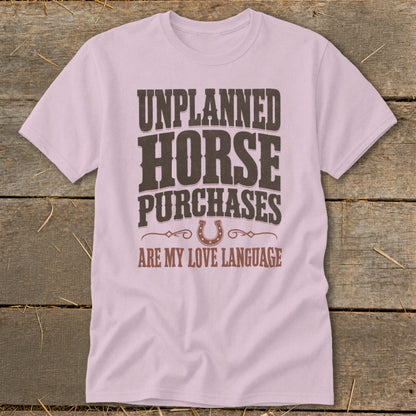 Pink t-shirt with text: Unplanned Horse Purchases Are My Love Language.