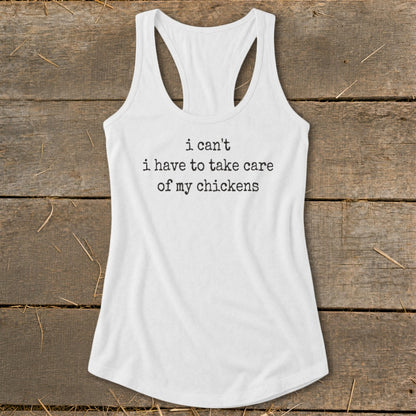 White tank top with "i can't have to take care of my chickens" text.