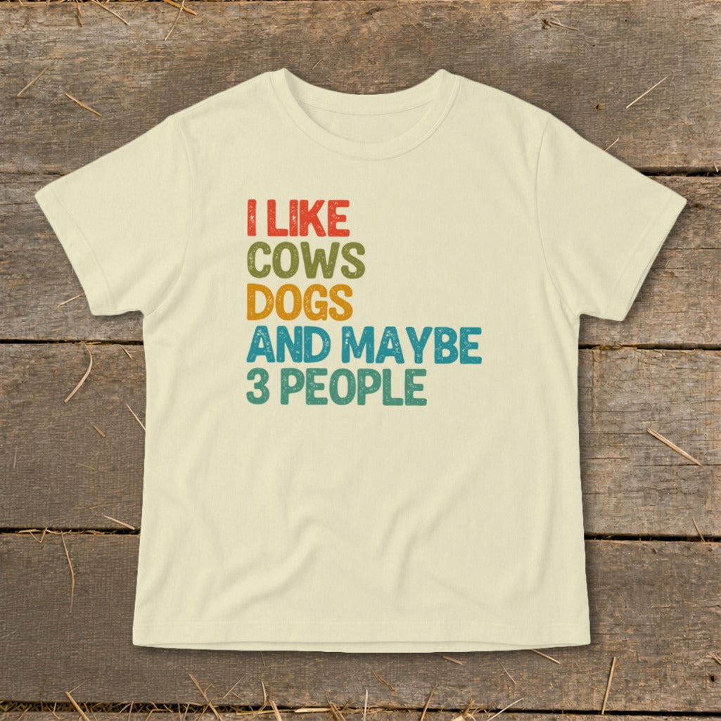 Cream t-shirt with text "I LIKE COWS DOGS AND MAYBE 3 PEOPLE".