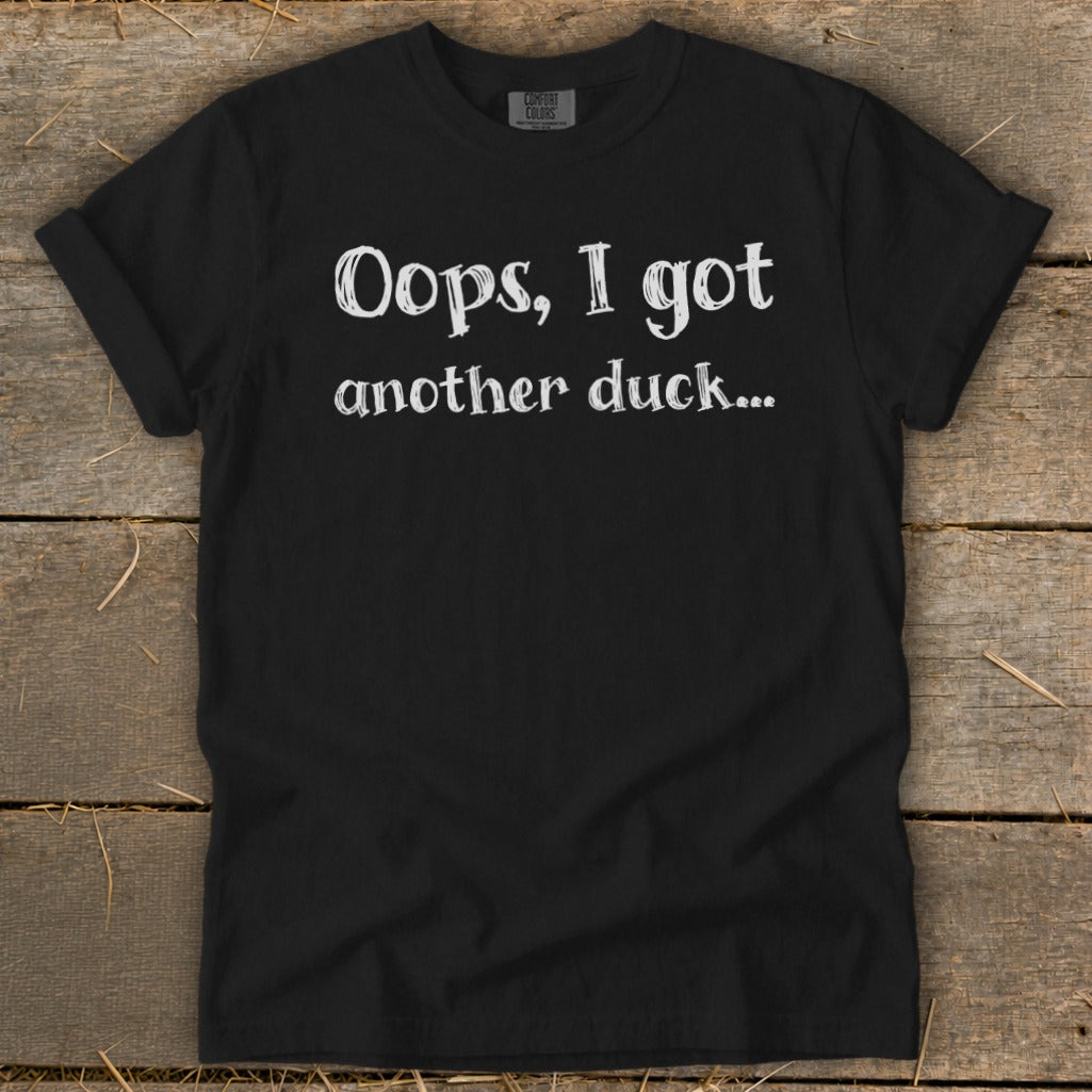 Black t-shirt with white text "Oops, I got another duck..."