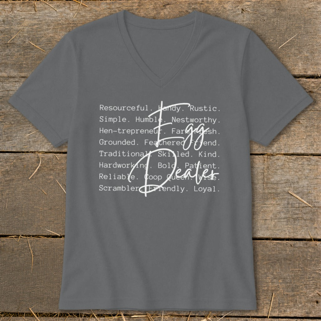 Grey v-neck t-shirt with "Egg Dealer" in white text and descriptive words.