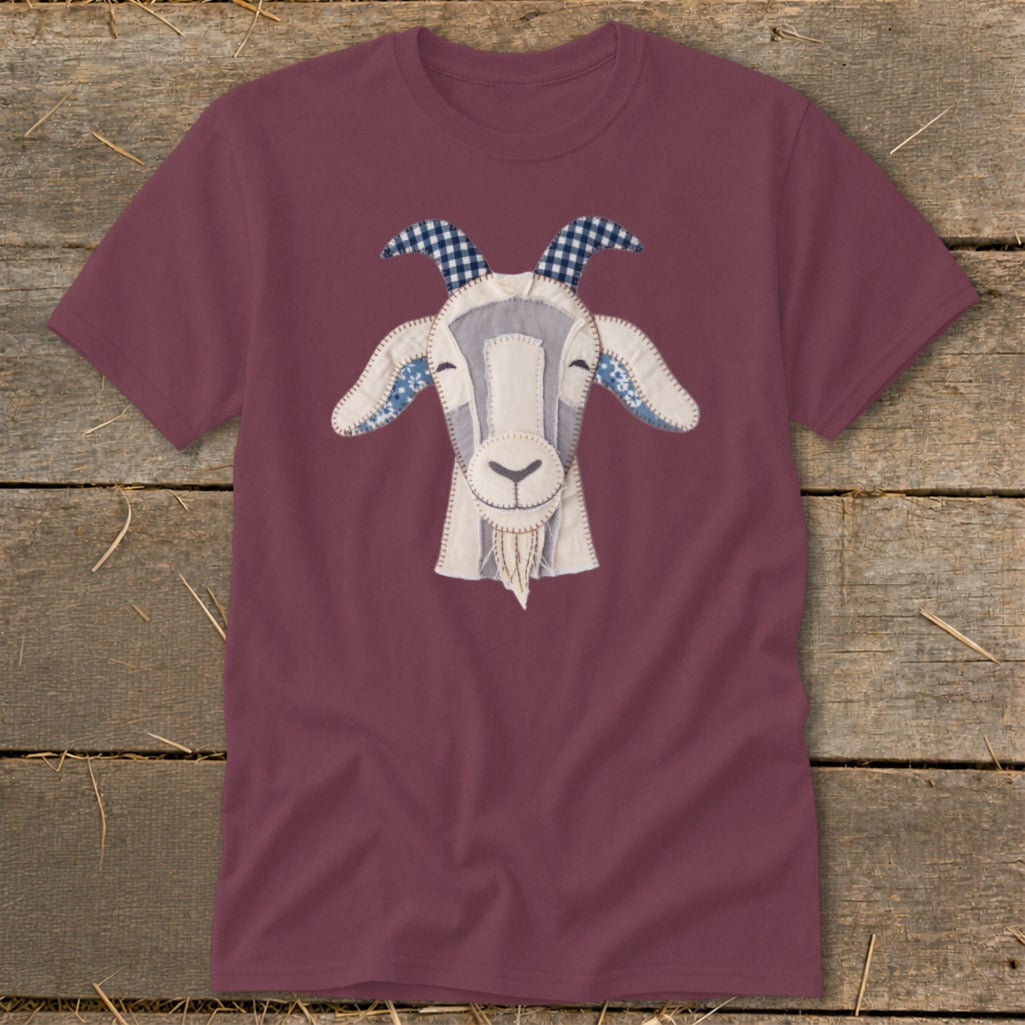 Maroon t-shirt with a stitched applique goat face design.