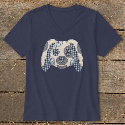 Navy v-neck t-shirt with a fabric applique dog face on the front.