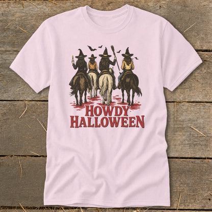 Four witches on horses ride with brooms, bats, and text "Howdy Halloween".