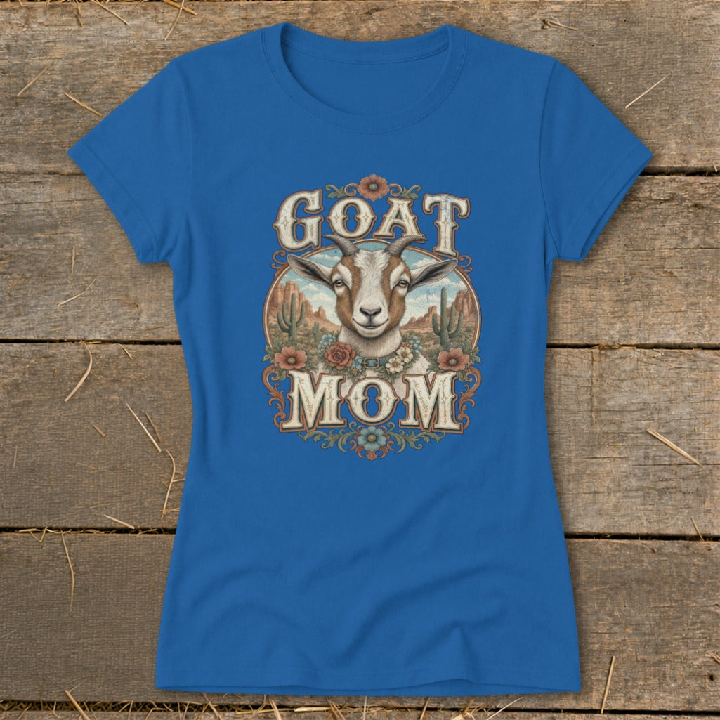 Blue t-shirt with "Goat Mom" text and a goat head illustration with desert scenery.