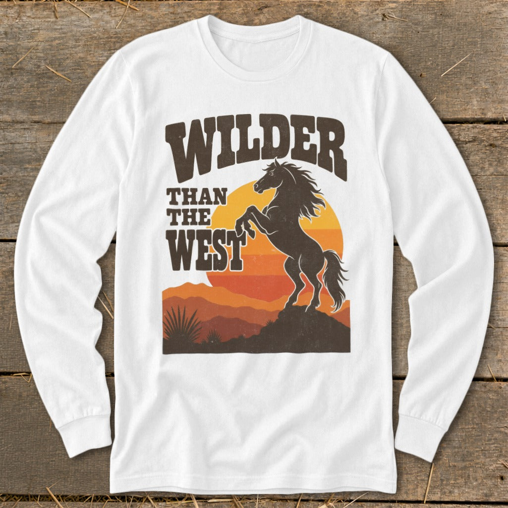 White long-sleeve shirt with "Wilder Than The West" text and a rearing horse graphic.
