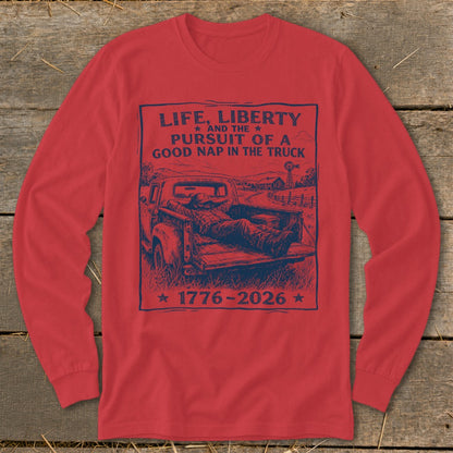 Red long sleeve shirt with "Life, Liberty, and the Pursuit of a Good Nap in the Truck" graphic.