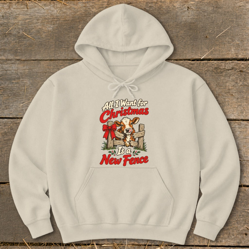 Cream hoodie with Christmas cow graphic: "All I Want for Christmas Is a New Fence"