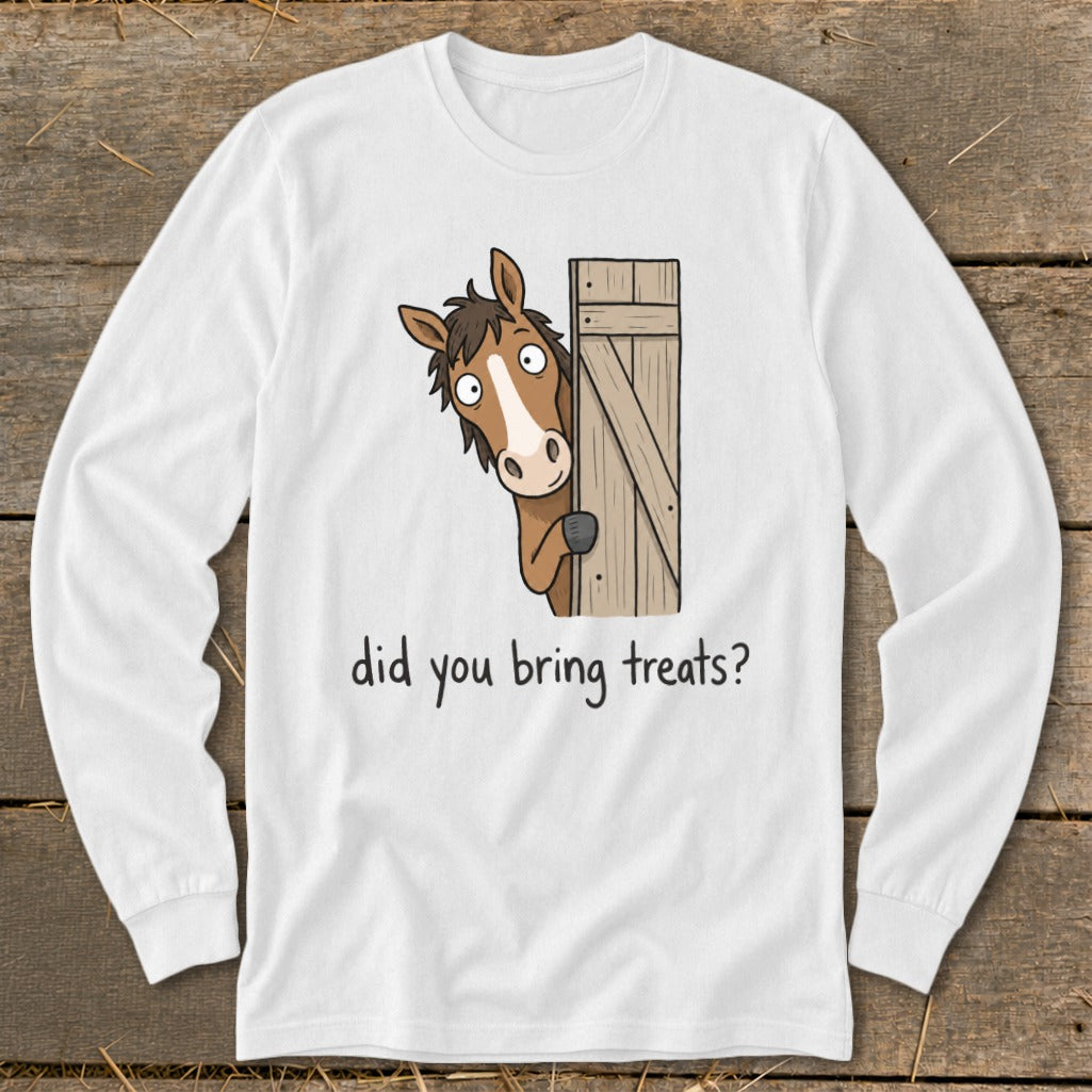 White long-sleeve shirt with cartoon horse peeking from a wooden gate, asking "did you bring treats?".