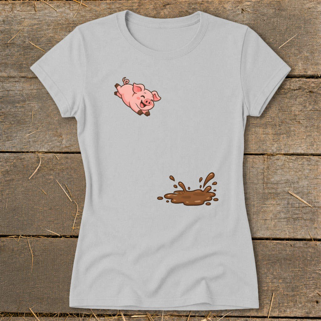 Light gray t-shirt with a cartoon pig jumping over a mud puddle design.