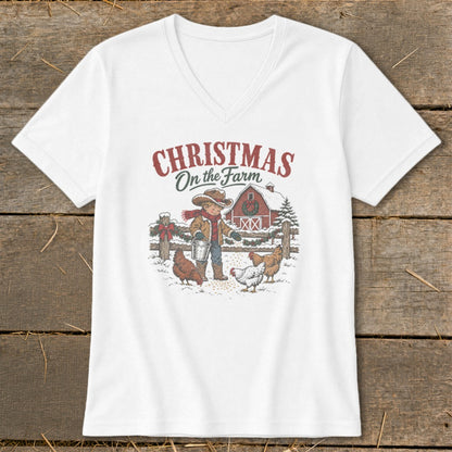 Christmas On the Farm graphic with a boy, chickens, and a barn in snow.