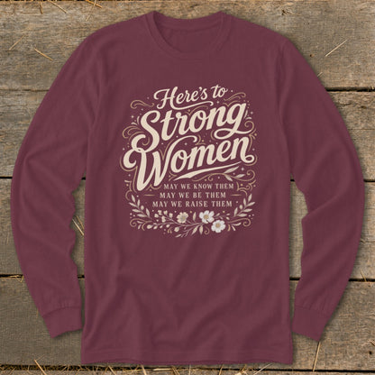 Maroon long-sleeve shirt with "Here's to Strong Women" and floral design.