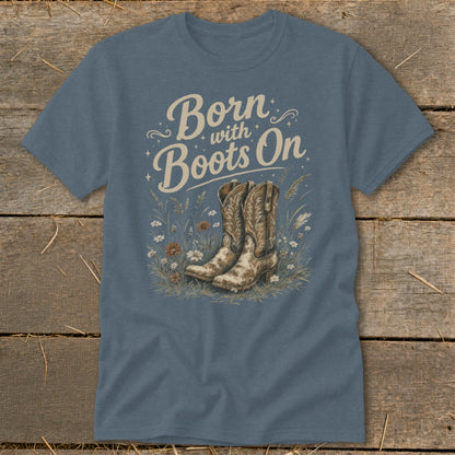 Blue t-shirt with "Born with Boots On" text and cowboy boots illustration.