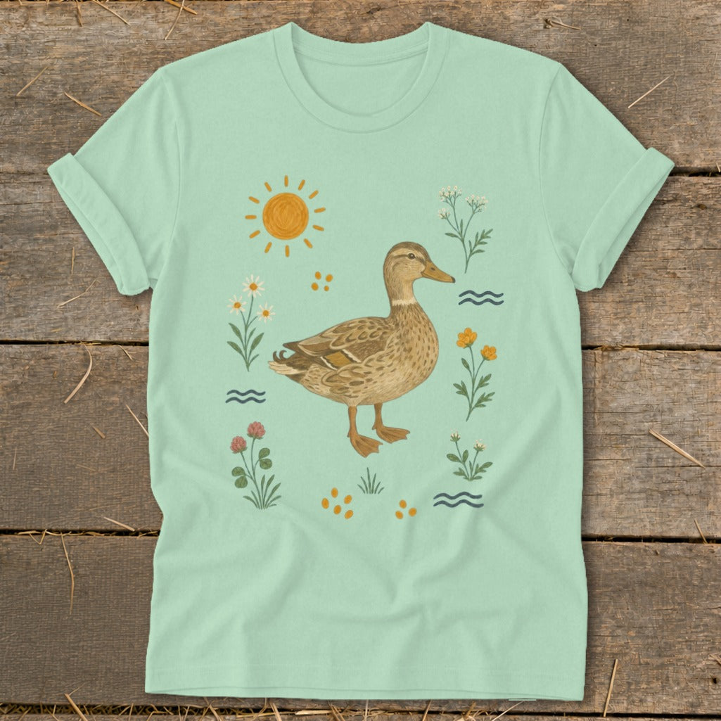 A duck stands amidst flowers, sun, and water waves.