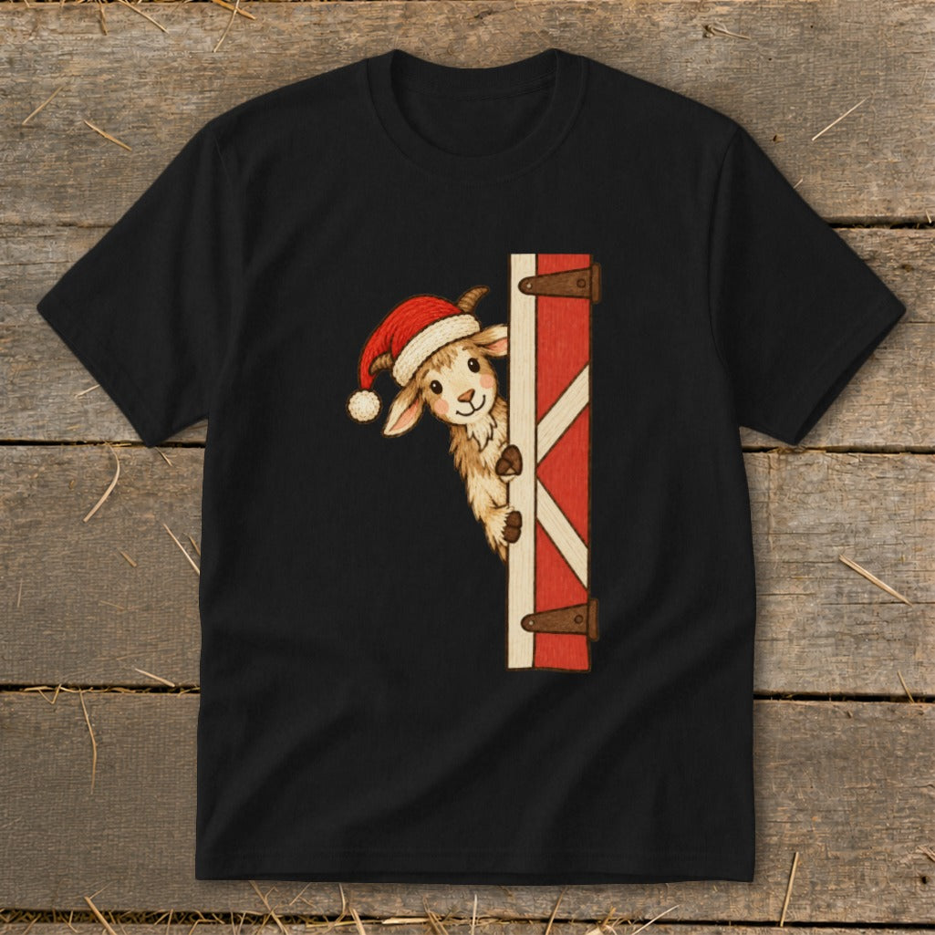 Cute goat wearing Santa hat peeking from behind a barn door.
