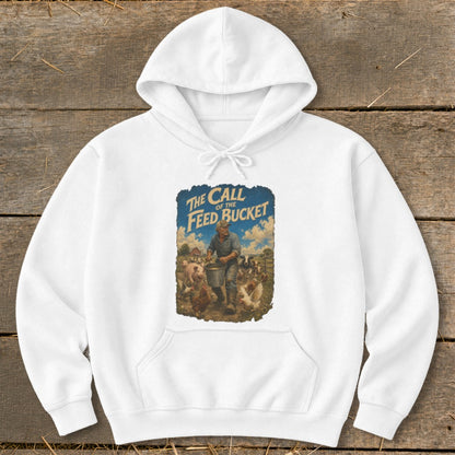White hoodie with a graphic reading "The Call of the Feed Bucket" featuring a farmer feeding farm animals.
