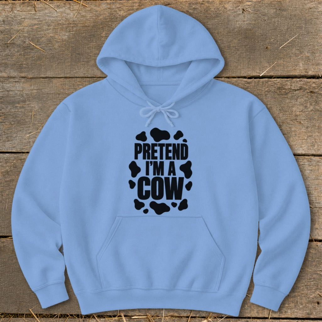 Light blue hoodie with "Pretend I'm a Cow" text and cow spots design.