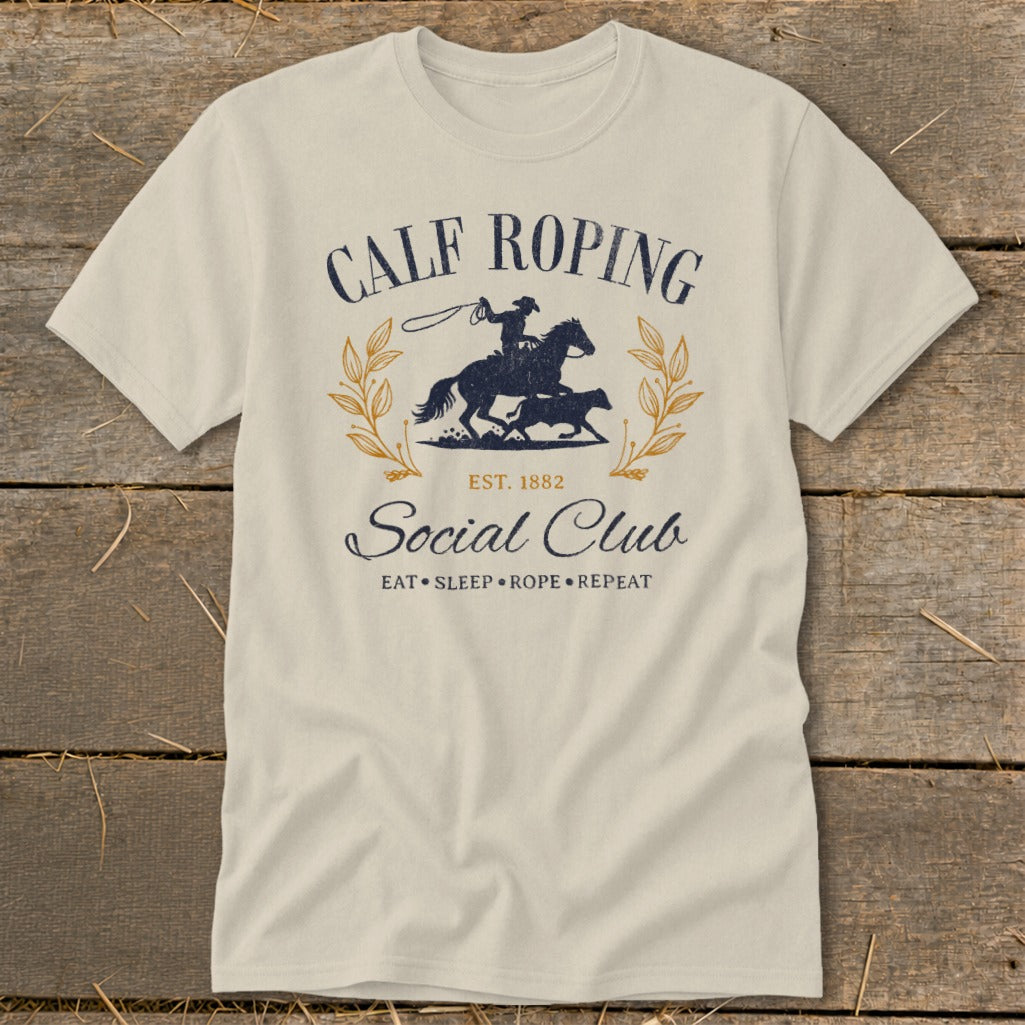 Calf Roping Social Club t-shirt with cowboy on horse and calf graphic.