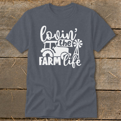 Gray t-shirt with white graphic of a tractor and windmill, reads "lovin' the FARM life".