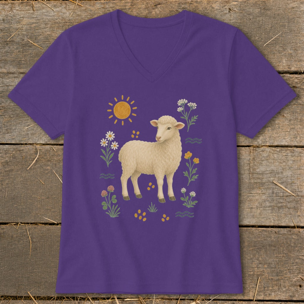 Purple t-shirt with a cream sheep and colorful floral graphic.