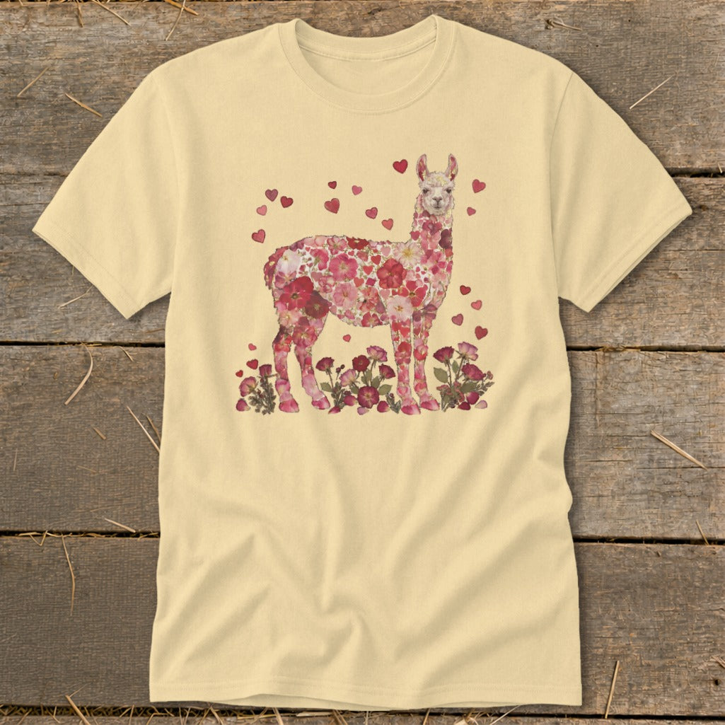 Light yellow t-shirt with a llama made of flowers and small red hearts.