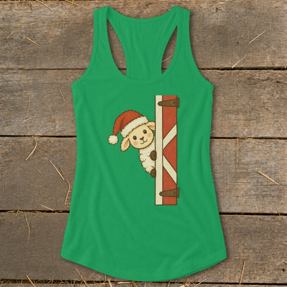 Green tank top with a graphic of a sheep wearing a Santa hat peeking from behind a barn door.