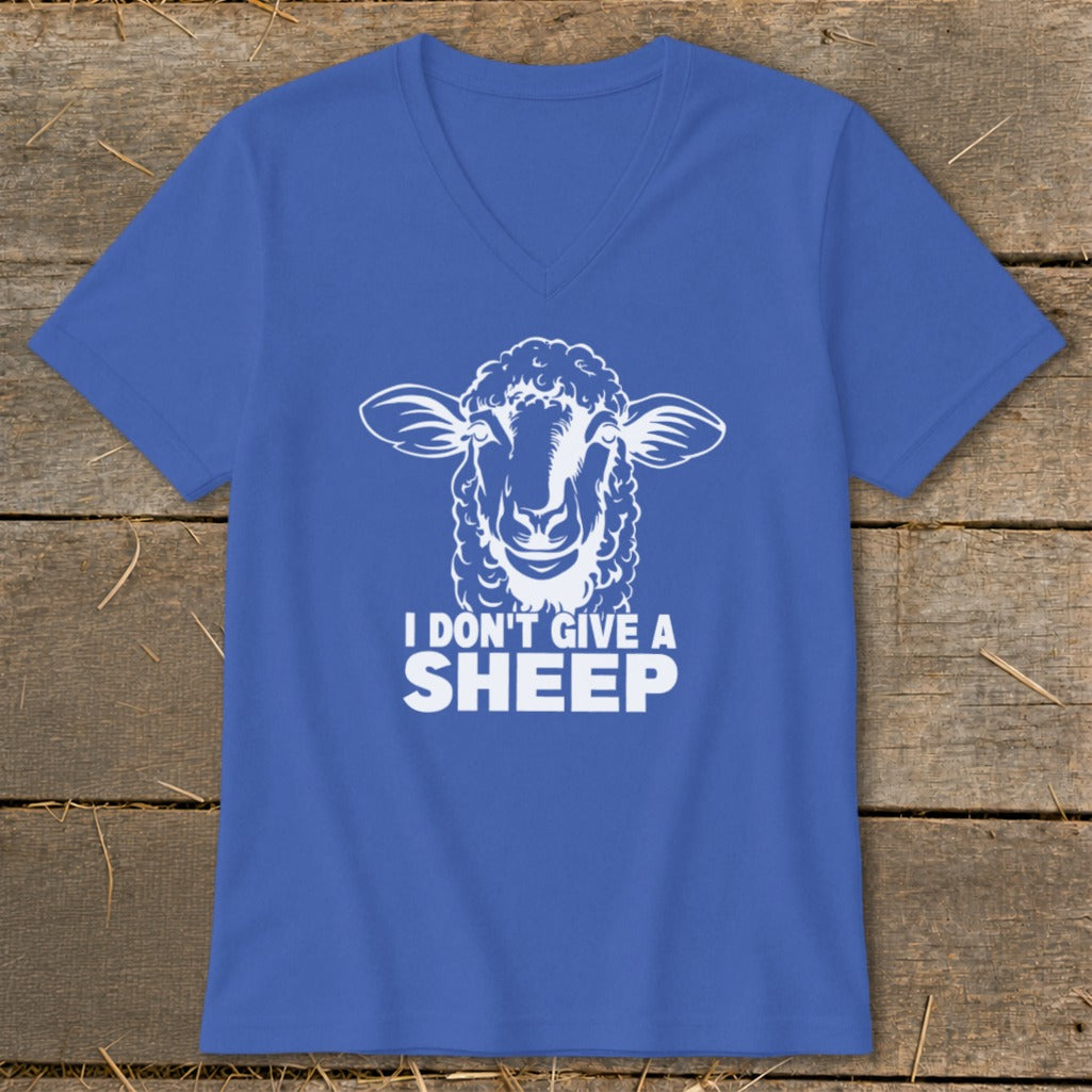 Royal blue v-neck t-shirt with a white sheep graphic and the text "I DON'T GIVE A SHEEP".