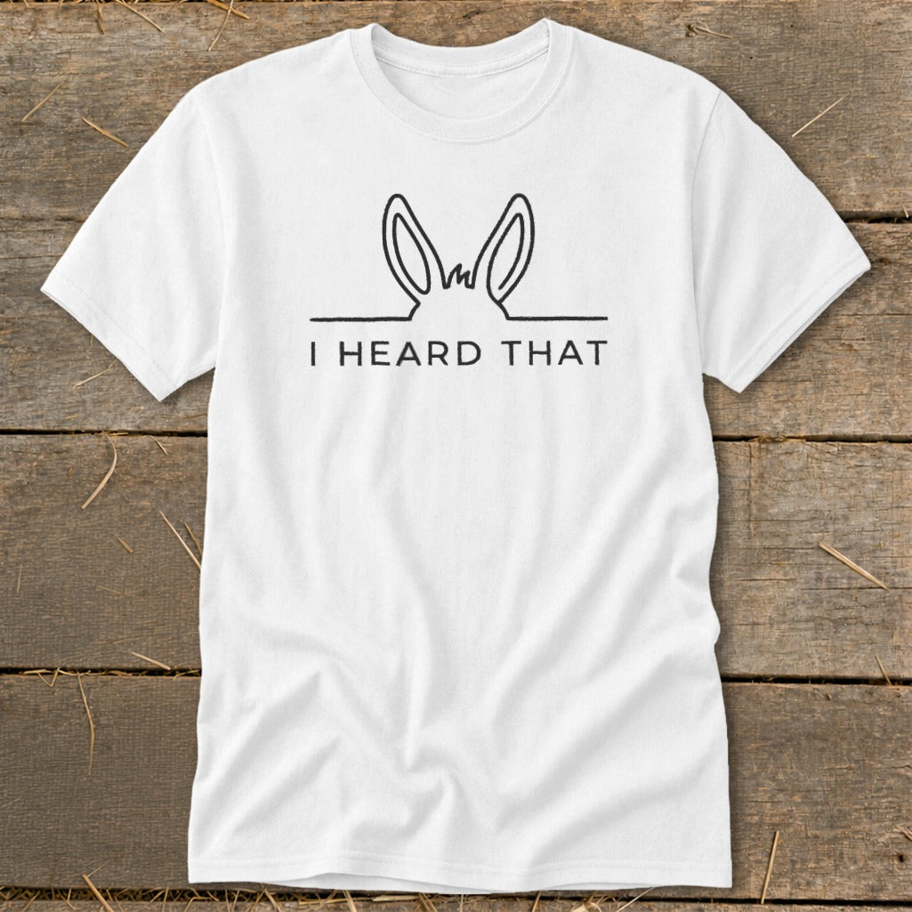 White t-shirt with a line drawing of donkey ears and the text "I HEARD THAT".