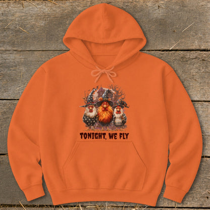 Orange hoodie with three cartoon chickens in witch hats and the text "TONIGHT, WE FLY".
