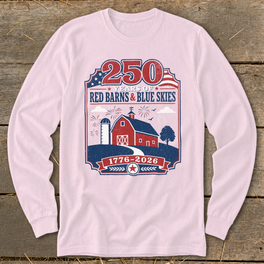 Pink long-sleeve shirt with a graphic celebrating 250 years of Red Barns & Blue Skies, 1776-2026.
