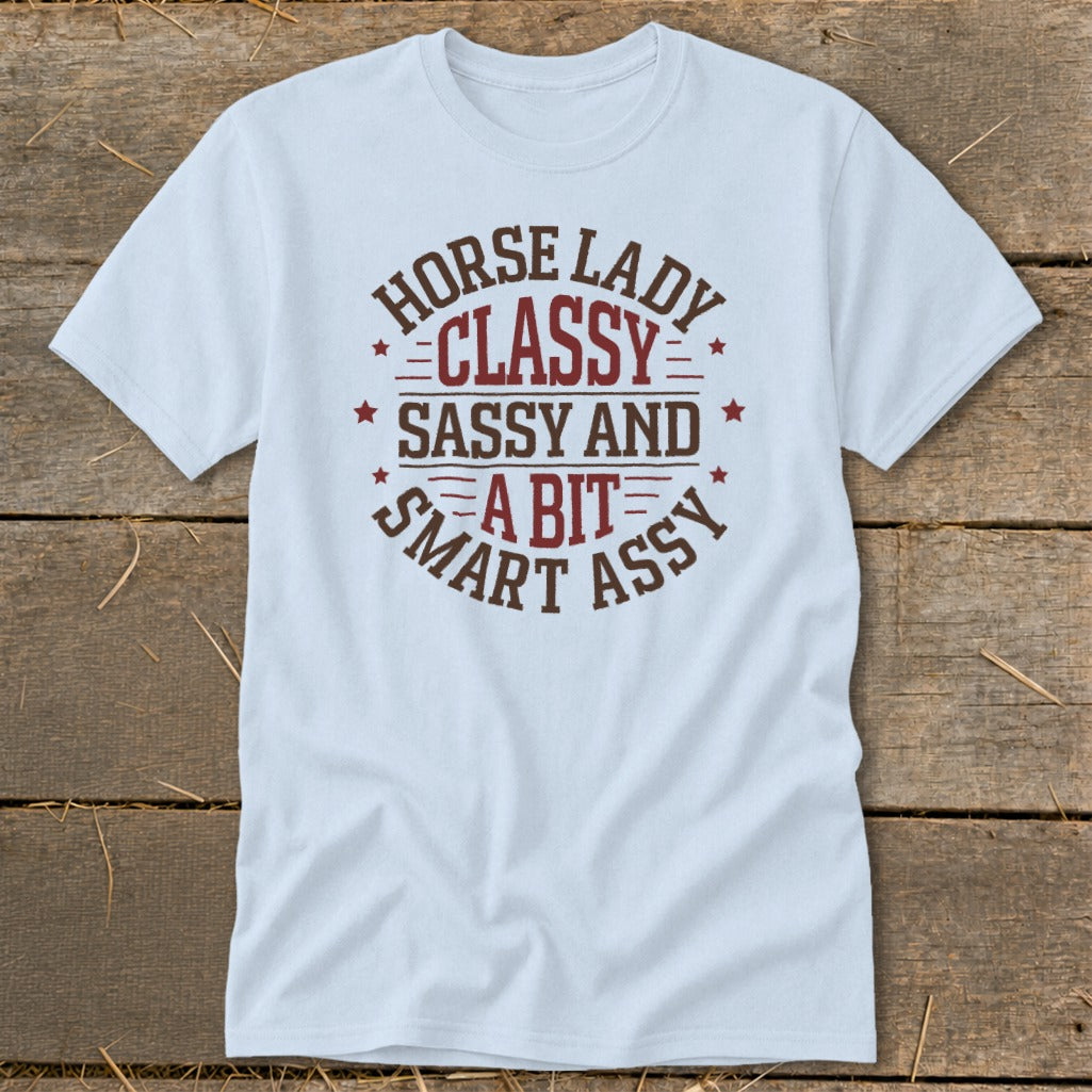 Light blue t-shirt with "Horse Lady Classy Sassy and a bit Smart Assy" text design.