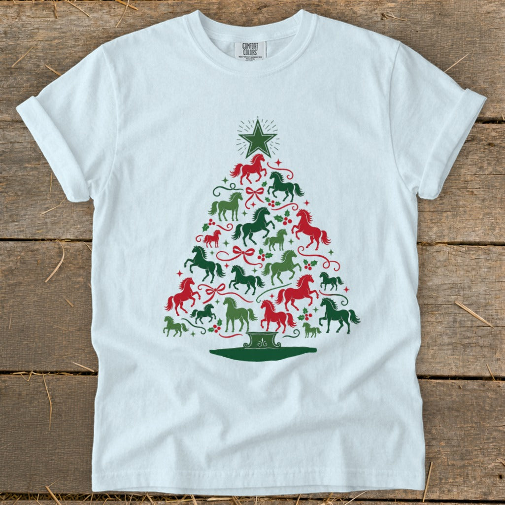 White t-shirt with a Christmas tree design made of red and green horses.
