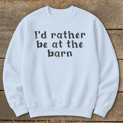 Light blue crewneck sweatshirt with black text that reads "I'd rather be at the barn".