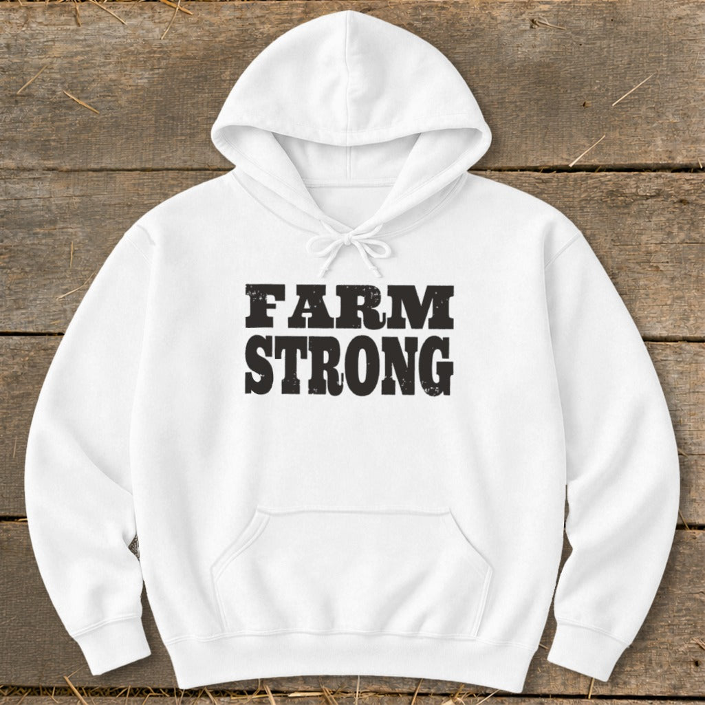 A white hooded sweatshirt with the text FARM STRONG printed in distressed black letters on the chest.