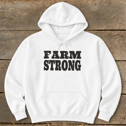 A white hooded sweatshirt with the text FARM STRONG printed in distressed black letters on the chest.